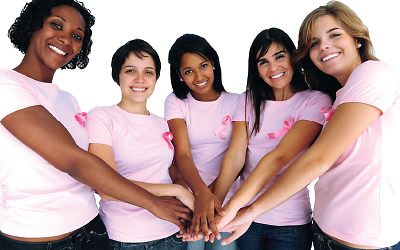 Photo of five women of diverse ethnicity, all wearing pink t-shirts and breast cancer awareness ribbons. 