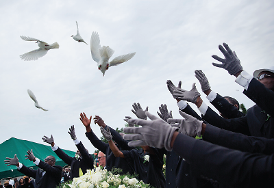 Photo: Pallbearers release doves over the casket of one of the nine people killed in the shooting at Emanuel AME Church last month in Charleston, S.C.
