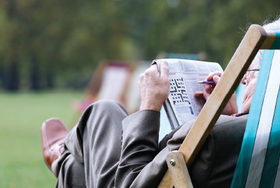 Photo: Person doing a crossword