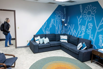 Image of a room with calming colors and patterns adorning the interior of the Amplify Center for young adults, creating a safe and relaxing space.