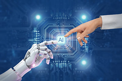 Photo illustration of a robot hand touching a human hand.
