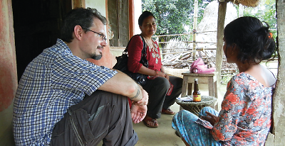 Brandon Kohrt, M.D., Ph.D. and colleague Maya Shrestha interview a former child soldier in Nepal.