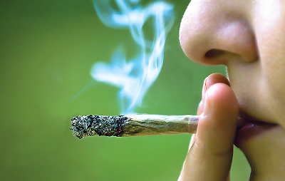 Photo: woman smoking marijuana 