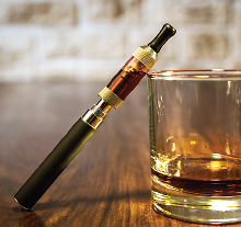 Photo: E-cigarette and a drink
