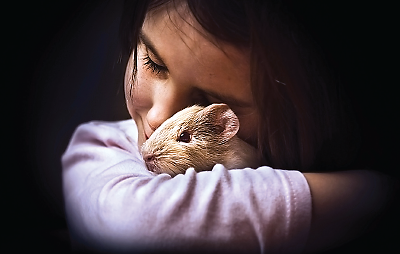 Photo: Girl and hamster
