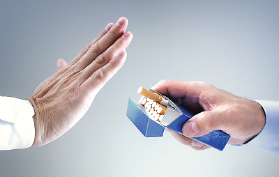 Photo: Hands rejecting cigareetes