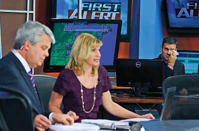 Photo: WDBJ-TV7 meteorologist Leo Hirsbrunner (right) wipes his eyes as Kimberly McBroom and Steve Grant anchor the early morning newscast at the station in Roanoke, Va., on August 27, the day after reporter Alison Parker and cameraman Adam Ward were killed during a live broadcast. See story below.