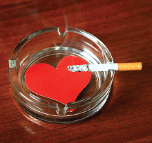 Photo: Cigarette in ashtray