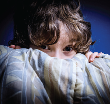Photo: Child with blanket
