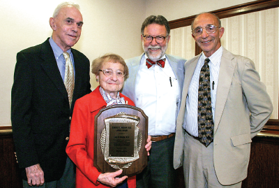 Photo: Lucy Ozarin, M.D., M.P.H., poses with Lifers President Raphael S. Good, M.D. (left), and former Lifers presidents Captane Thomson, M.D., and Philip Margolis, M.D.