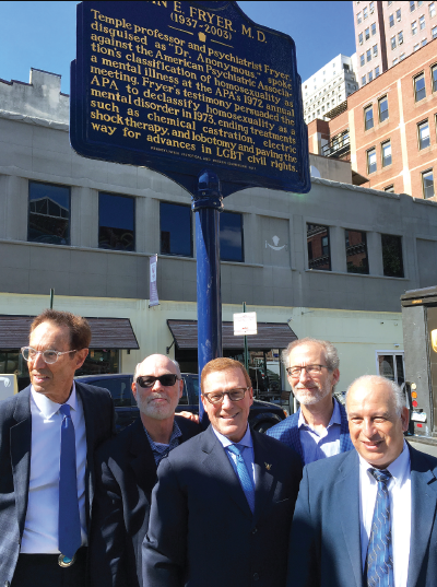 Photo: Pictured beneath the historic marker about John Fryer, M.D., are (from left) Malcolm Lazin, executive director of Equality Forum; Roy Harker, M.D., executive director of the Association of Gay and Lesbian Psychiatrists; APA CEO and Medical Director Saul Levin, M.D., M.P.A.; Richard Summers, M.D., APA trustee-at-large and senior residency advisor in the Department of Psychiatry at the University of Pennsylvania Perelman School of Medicine; and Kenneth Certa, M.D., APA Assembly representative from Pennsylvania and director of the psychiatry residency training program at Thomas Jefferson University Hospital.