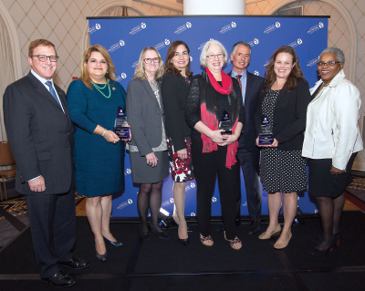 Photo: APA presented its second APEX Awards at a ceremony in Washington, D.C., last month. Among the participants were (from left) Saul Levin, M.D., M.P.A., APA CEO and medical director; Jenniffer González-Colón, Puerto Rico resident commissioner; Anita Everett, M.D., APA president; Theresa Miskimen, M.D., Assembly speaker; Kathryn Farinholt, executive director of NAMI Maryland; James (Bob) Batterson, M.D., Assembly speaker-elect; Amy Grace, M.D., health policy advisor for U.S. Sen. Brian Schatz (D-Hawaii); and Altha Stewart, M.D., APA president-elect.