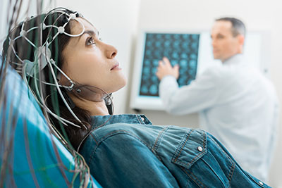 Photo: Photo of woman receiving EEG