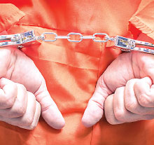 Photo: Person in handcuffs