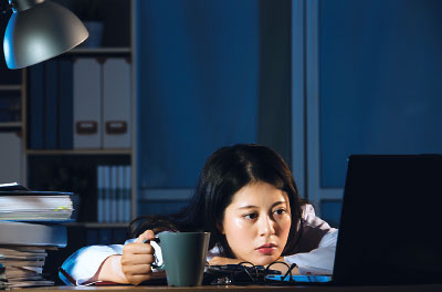 Photo: Woman at computer