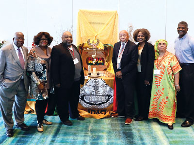 Photo: Officers and elders of the Black Psychiatrists of America gather before a memorial honoring prominent black psychiatrists and commemorating black history. From left: Samuel O. Okpaku, M.D., Ph.D., president; Shirley Marks, M.D., M.P.H., past president; William B. Lawson, M.D., Ph.D., treasurer; Billy E. Jones, M.D., M.S., member of the Council of Elders; Cassandra Newkirk, M.D., M.B.A., member of the Council of Elders; Patricia A. Newton, M.D., M.P.H., M.A., CEO and medical director, past president, and member of the Council of Elders; and Michael Ingram, M.D., immediate past president.