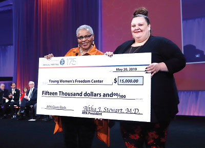 Photo: APA President Altha Stewart, M.D., presented a donation of $15,000 to this year’s recipient, the Young Women’s Freedom Center.