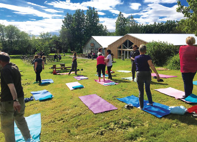 Photo: Residents practice yoga in Sólheimar.