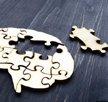 Photo: metallic puzzle shaped like a brain