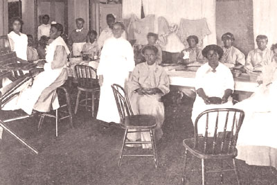 Photo: African-American patients seating around a table