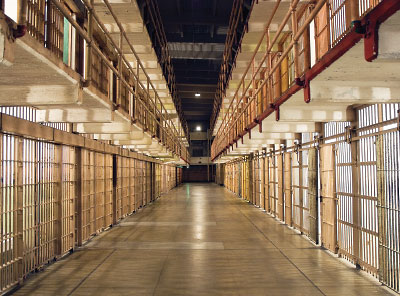 Photo: row of cells in a prison