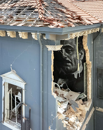 Photo: A 19th century residence torn open by a blast in Beirut in August 2020 reveals a mural of Gibran Kahlil Gibran, a Lebanese American poet, writer, and philosopher.