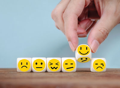 Photo: dices with emoji on their faces