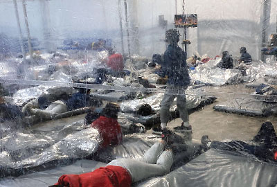 Photo: Detainees at the Southern border are photographed in March in a Customs and Border Protection temporary overflow facility in Donna, Texas.