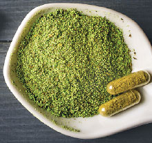 Photo: green powder and pills