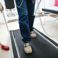 Person rehabbing on a treadmill
