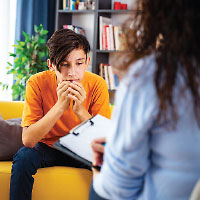 young person talking with therapist