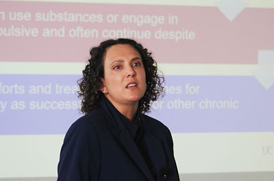 Photo: Carla Marienfeld, M.D., speaking at a meeting.