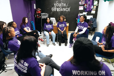 Photo: Students share their stories and connect during a Working on Womanhood group session.