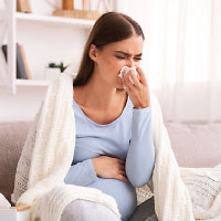 Pregnant woman with a cold