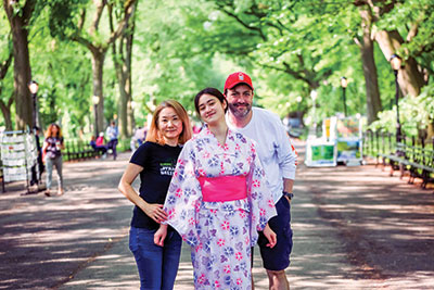 Photo of Masako, Naomi, and Ethan Sacks in Central Park.