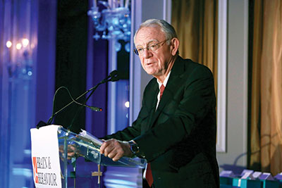 Photo of Herbert Pardes, M.D. speaking behind a podium.